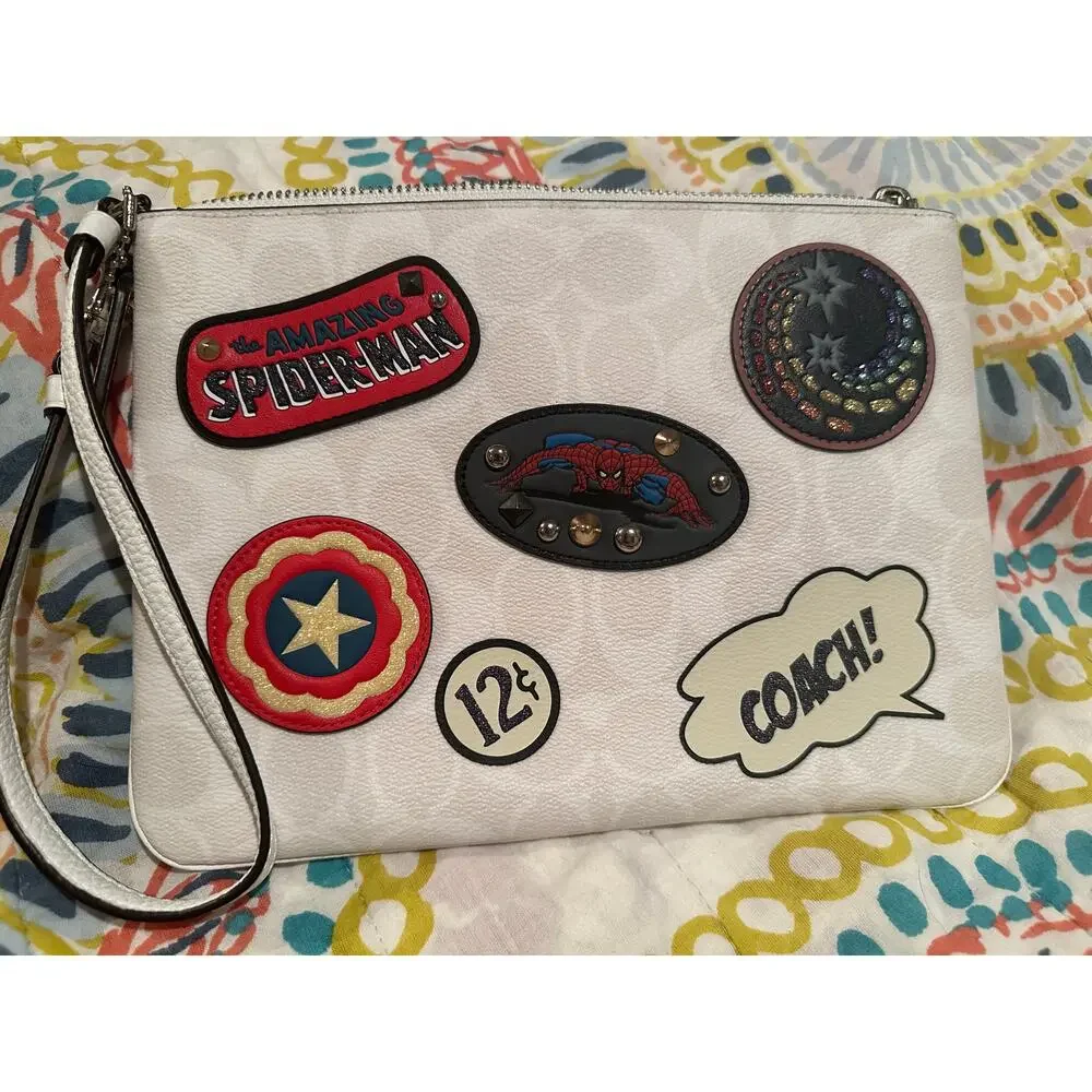NWOT Coach x Marvel Gallery Pouch signature canvas Marvel patches wristlet
